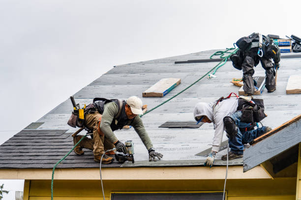Professional Gutter Installation technician working in Estero, FL